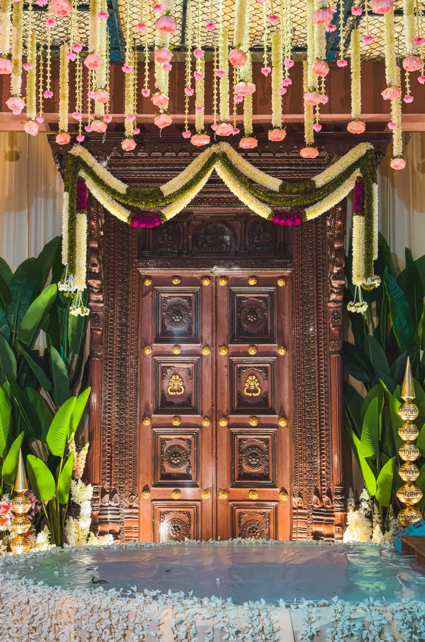 A traditional carved wedding doorway decorated by Garuda